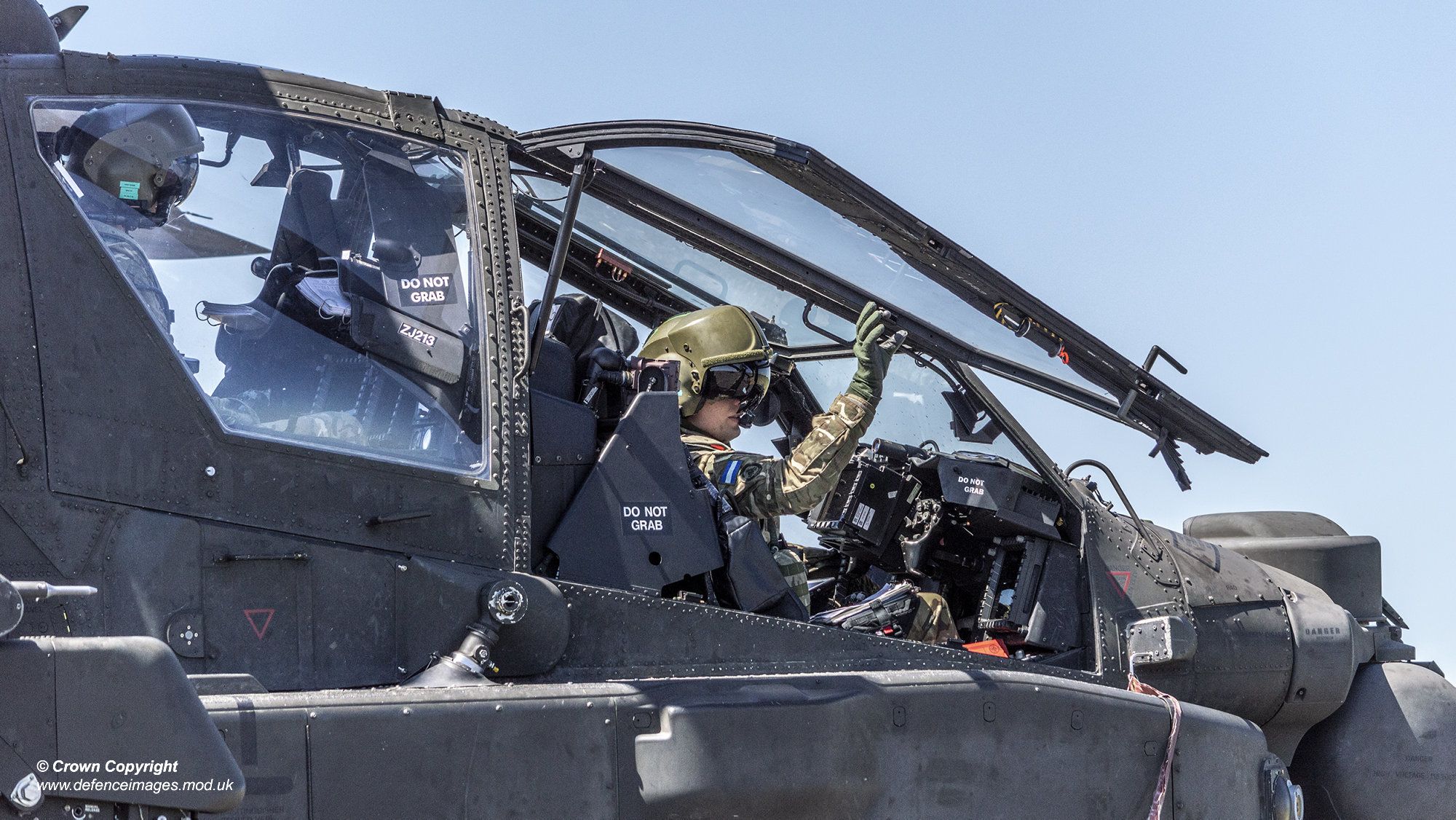 decorative image of serviceman piloting a helicopter